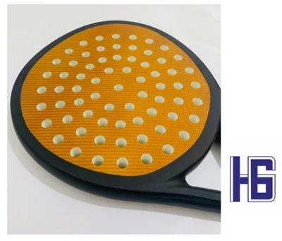 L-oriġini u l-karatteristiċi tal-paddles tal-pickleball.